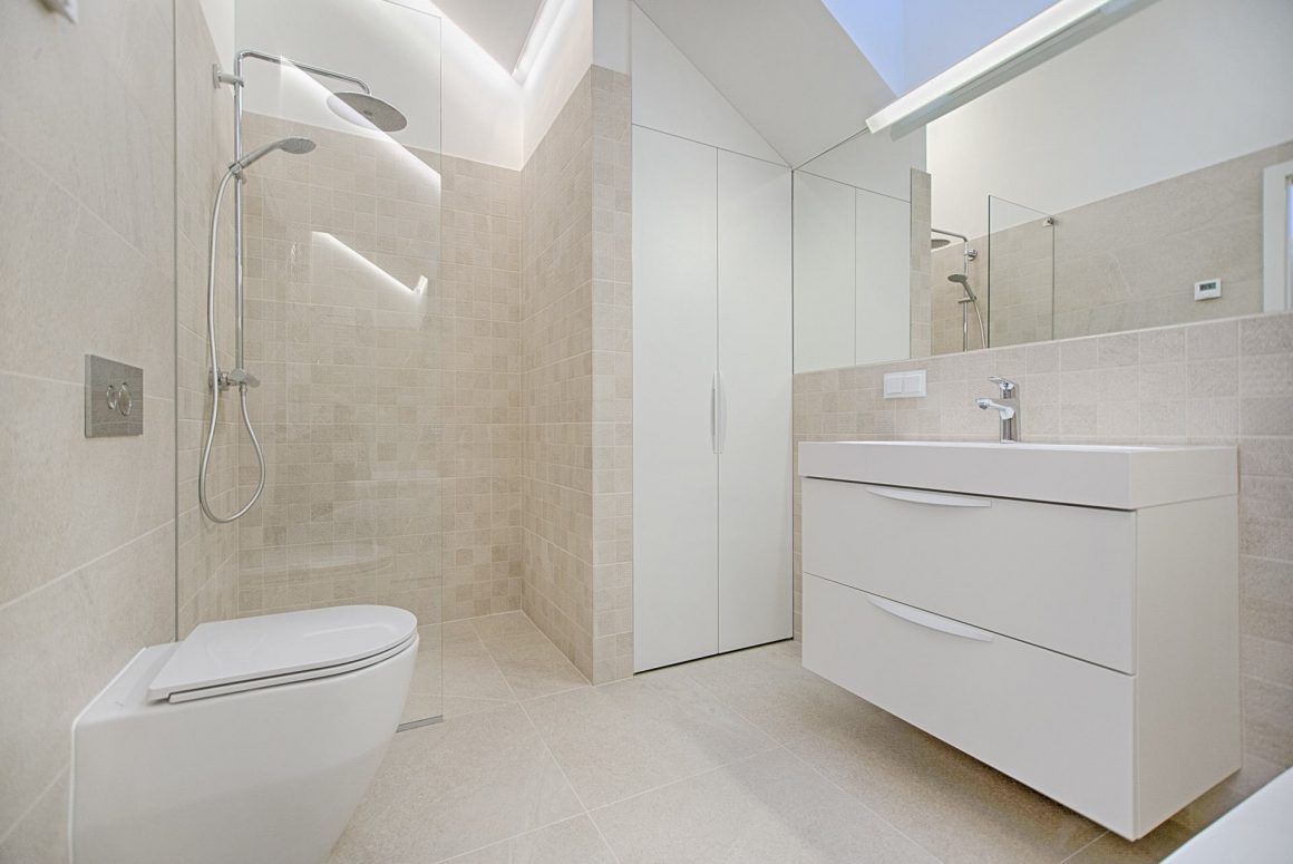 white bathroom with large vanity home storage unit 